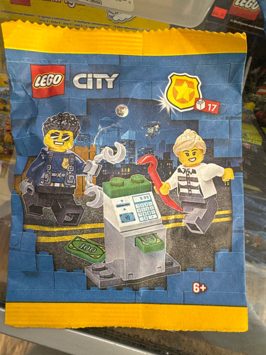 952304 Policeman and Crook with ATM paper bag